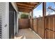 Private patio with wooden fence and sliding glass doors at 601 Park Ridge Cir, Marietta, GA 30068