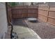 Private backyard with a trampoline and wood chip ground cover, creating a fun and safe play area at 3534 S Sherwood Se Rd, Smyrna, GA 30082