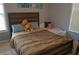 Cozy bedroom featuring a comfortable bed with soft bedding, perfect for a or guest room at 3534 S Sherwood Se Rd, Smyrna, GA 30082