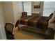 Cozy bedroom with a comfortable bed, dresser, and warm lighting, creating a relaxing and inviting atmosphere at 3534 S Sherwood Se Rd, Smyrna, GA 30082