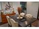 Dining room with a dark wood table, tufted chairs, and adjacent to the kitchen at 3534 S Sherwood Se Rd, Smyrna, GA 30082