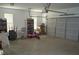 Spacious two-car garage with ample storage shelving and an automatic door at 3534 S Sherwood Se Rd, Smyrna, GA 30082