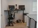This home office area features dual monitors, an adjustable desk, and ample natural light, creating an ideal workspace at 3534 S Sherwood Se Rd, Smyrna, GA 30082