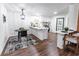 Updated kitchen boasts white cabinets and a breakfast bar at 157 Pebble Path, Douglasville, GA 30134