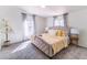 Serene main bedroom featuring plush carpet and ample natural light at 157 Pebble Path, Douglasville, GA 30134