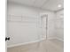 Walk-in closet with wire shelving at 7685 Homer Dr, Cumming, GA 30028