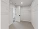 Walk-in closet with wire shelving at 7685 Homer Dr, Cumming, GA 30028
