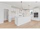 Well-designed kitchen featuring a center island, stainless steel appliances, and ample storage space in white cabinets at 7685 Homer Dr, Cumming, GA 30028