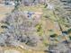 An aerial view of the property, with a yellow line indicating the boundary at 3179 Meadow Trl, Loganville, GA 30052