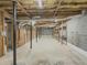 Unfinished basement with concrete floors and gray cinder block walls at 3179 Meadow Trl, Loganville, GA 30052