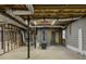 Unfinished basement with exposed ductwork, concrete floors and gray cinder block walls at 3179 Meadow Trl, Loganville, GA 30052