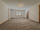 Bedroom with carpet, neutral walls, and natural light at 3179 Meadow Trl, Loganville, GA 30052