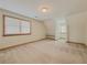 Bright bedroom with carpet, built-in desk, and natural light at 3179 Meadow Trl, Loganville, GA 30052