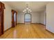 Open-concept dining room with hardwood floors, perfect for Gathering gatherings at 3179 Meadow Trl, Loganville, GA 30052