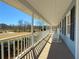 Inviting covered front porch with white rocking chairs, perfect for relaxing at 3179 Meadow Trl, Loganville, GA 30052