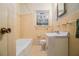 Bathroom featuring a bathtub, sink, and a window for natural light at 2436 Hazelwood Ne Dr, Atlanta, GA 30345