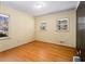 Bedroom with hardwood floors and two large windows providing natural light at 2436 Hazelwood Ne Dr, Atlanta, GA 30345