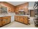 Functional kitchen featuring wood cabinets, modern appliances, and ample counter space at 2436 Hazelwood Ne Dr, Atlanta, GA 30345