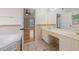 Bright bathroom featuring double vanity and bathtub at 2800 Jona Trl, Dacula, GA 30019