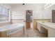 Large bathtub area in elegant bathroom at 2800 Jona Trl, Dacula, GA 30019