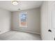 Cozy bedroom featuring neutral tones, carpet flooring and natural light at 2800 Jona Trl, Dacula, GA 30019