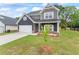 Charming home with a spacious lawn, perfect for outdoor activities and curb appeal at 11204 Cornerstone Way, Hampton, GA 30228