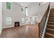 Spacious, open floor plan features a fireplace, high ceilings, large windows and modern flooring at 11204 Cornerstone Way, Hampton, GA 30228