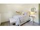 Bedroom featuring wood-look floors, neutral paint, and a bench seat at 136 Huntcliff Trl, Ellenwood, GA 30294