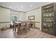 Cozy dining room with ample seating, perfect for enjoying meals with Gathering and friends at 136 Huntcliff Trl, Ellenwood, GA 30294