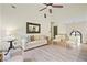 Bright and airy living room with high ceilings, stylish furniture, and a cozy atmosphere at 136 Huntcliff Trl, Ellenwood, GA 30294