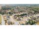 Expansive aerial view of a residential community, showcasing the lush tree coverage at 3377 Aberrone Pl, Buford, GA 30519