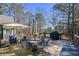 Spacious back deck featuring outdoor seating, a grill, and ample space for entertaining at 9001 East Carroll Rd, Winston, GA 30187