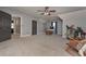 Large bonus room with gray walls, a ceiling fan, and neutral carpet for flexible usage at 9001 East Carroll Rd, Winston, GA 30187