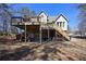 Exterior view of the house with a spacious deck perfect for outdoor enjoyment at 9001 East Carroll Rd, Winston, GA 30187