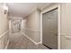 Long hallway in building, leading to unit 1302 at 1302 River Green Nw Dr # 1302, Atlanta, GA 30327