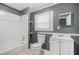 Bathroom features tile flooring, shower-tub combo and vanity with storage at 391 Mount Zion Sw Rd, Atlanta, GA 30354