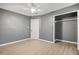 An airy bedroom with a closet and light wood-look flooring at 391 Mount Zion Sw Rd, Atlanta, GA 30354