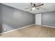 Spacious bedroom with ceiling fan and light wood-look floors at 391 Mount Zion Sw Rd, Atlanta, GA 30354