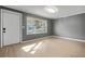 Bright living room with laminate flooring, fresh paint, and natural light at 391 Mount Zion Sw Rd, Atlanta, GA 30354