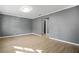 Spacious living room featuring laminate floors and neutral color walls at 391 Mount Zion Sw Rd, Atlanta, GA 30354