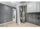 A utility room with a water heater and storage at 391 Mount Zion Sw Rd, Atlanta, GA 30354
