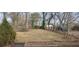 Large grassy backyard, ready for landscaping and outdoor activities at 2410 Macon Sw Dr, Atlanta, GA 30315