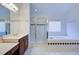 The bathroom features a vanity with sink, a shower and a bathtub at 5004 Duxford Se Dr, Smyrna, GA 30082