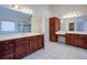 Spacious bathroom featuring double sinks, cabinets, and a walk in shower at 5004 Duxford Se Dr, Smyrna, GA 30082