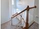 Bright foyer features high ceilings, hardwood staircase, and chandelier at 5004 Duxford Se Dr, Smyrna, GA 30082