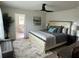 Comfortable bedroom with a ceiling fan, and en suite bathroom access at 5372 Tolar Rd, South Fulton, GA 30213