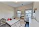 Bright bedroom with hardwood floors and a comfortable bed at 373 Via Secco Ln, Suwanee, GA 30024