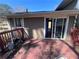 View of the back deck, showcasing sliding door access to the home at 5430 Old Bill Cook Rd, Atlanta, GA 30349