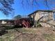 View of the backyard showcasing a wooden deck and home's exterior at 5430 Old Bill Cook Rd, Atlanta, GA 30349