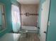 Bathroom with ceramic tile, a shower and a toilet that is in need of cleaning and repair at 5430 Old Bill Cook Rd, Atlanta, GA 30349